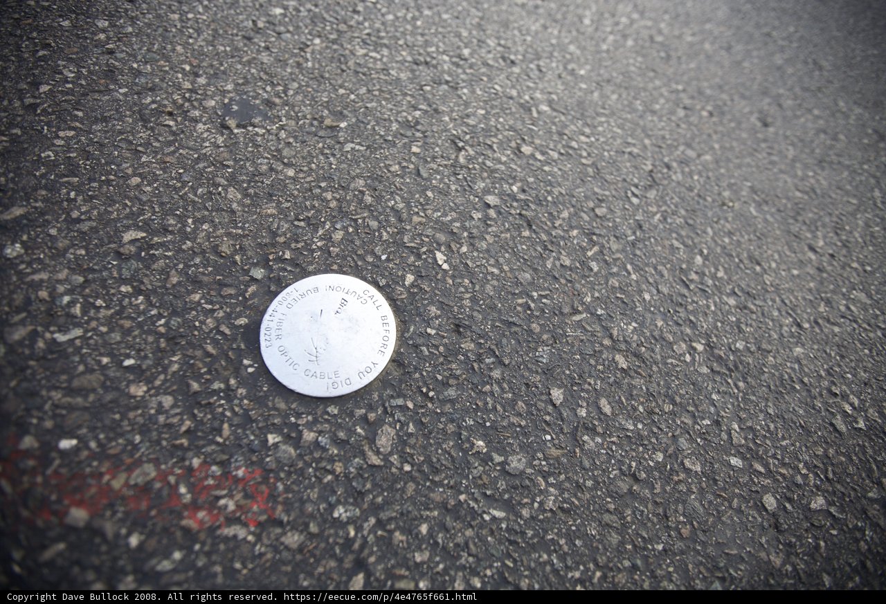 Lost Coin on Tarmac
