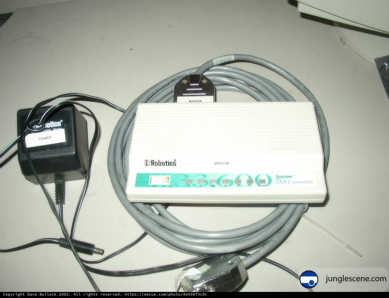 Vintage White Electronic Device with Adapter