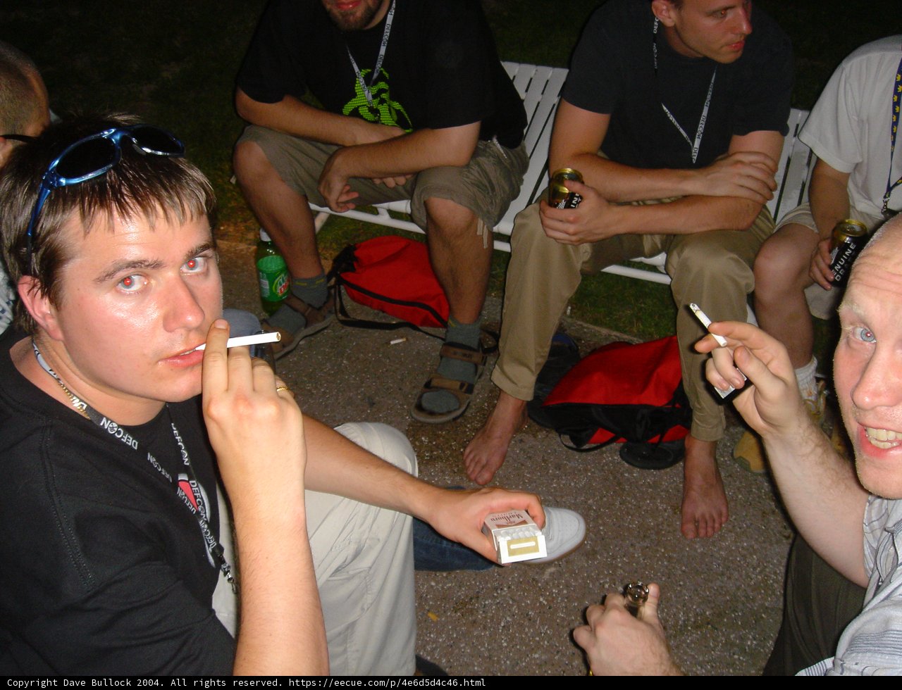 Black-Shirted Man Relaxing on a Folding Chair