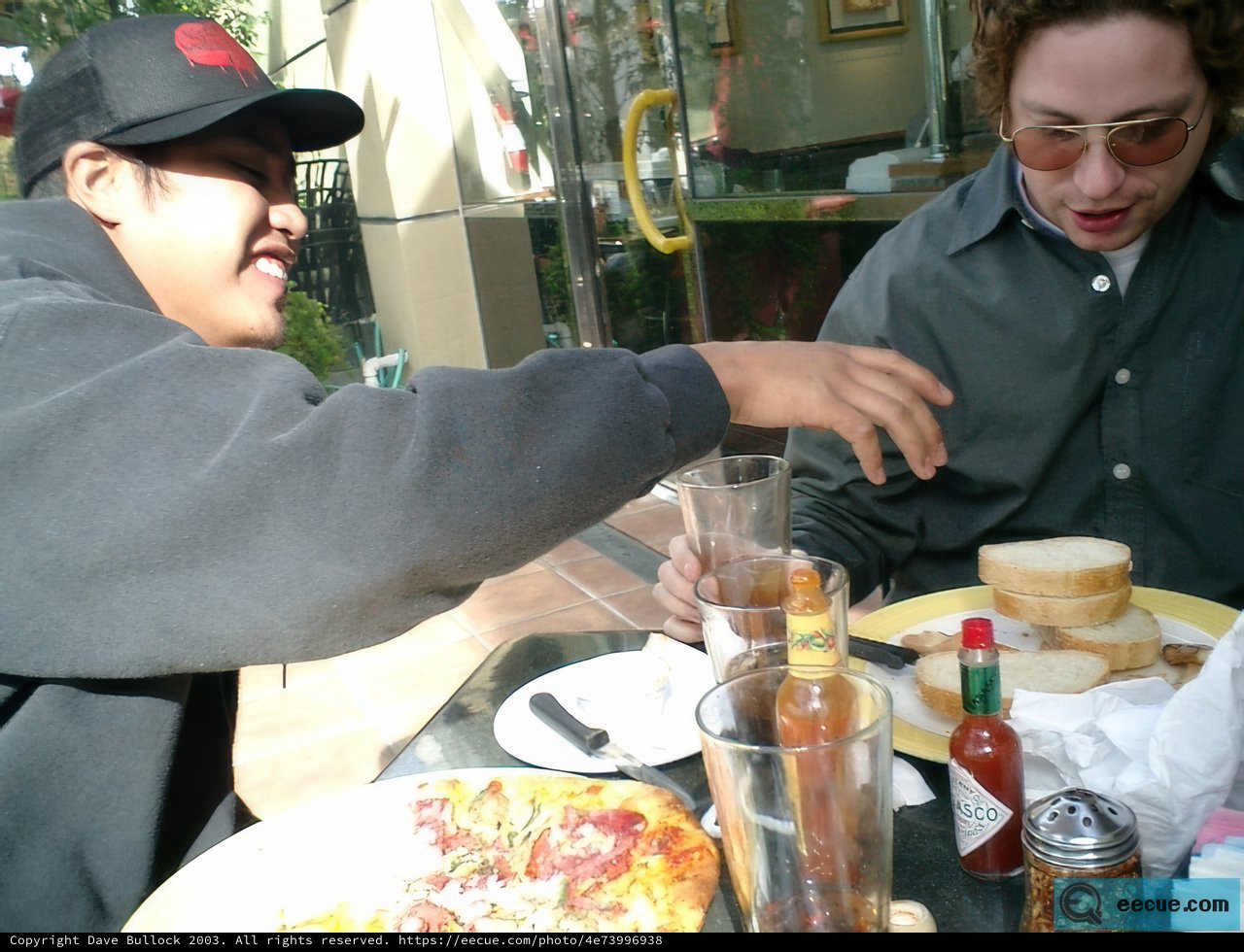 Man Enjoying Lunch in a Cozy Restaurant