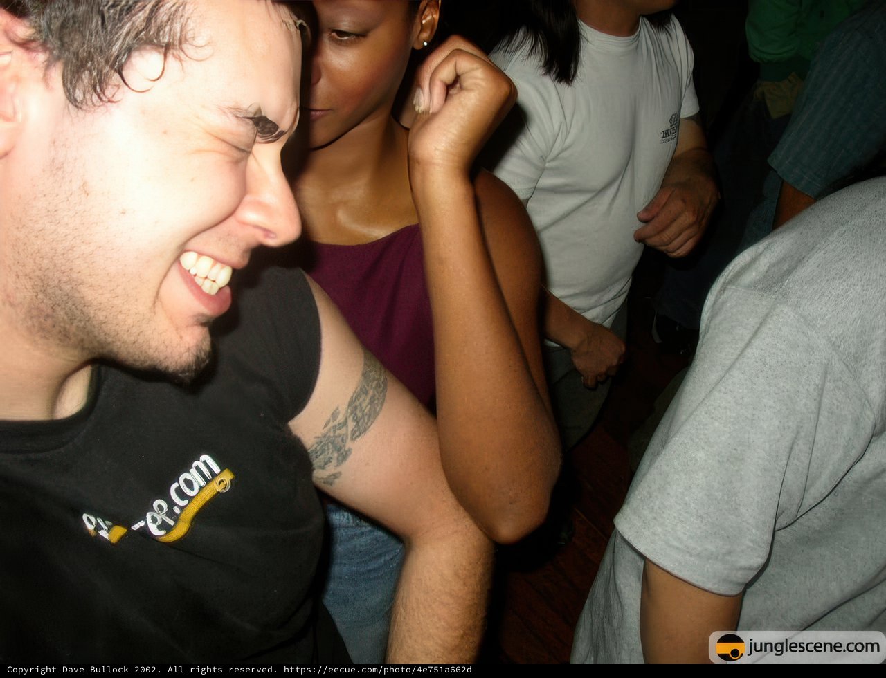 Tattooed Man in the Club
