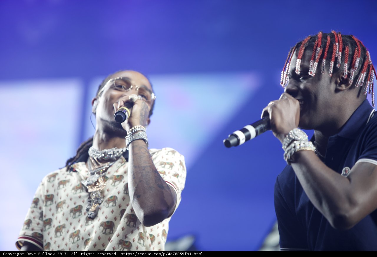 Soulful Duets Caption: Two men with dreads captivate the crowd with their stunning vocal harmonies at Coachella 2017.