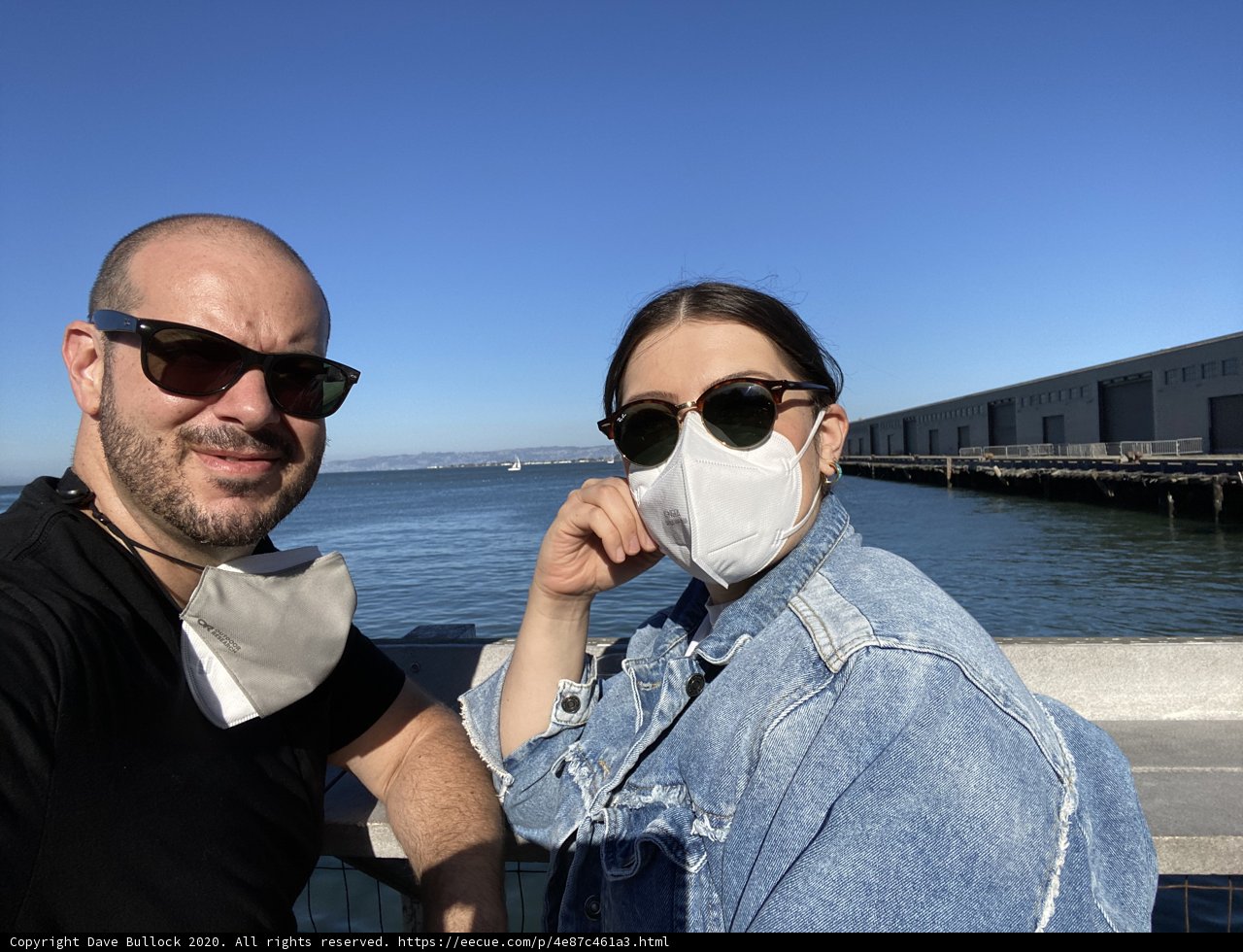 Masked Couple on San Francisco Pier