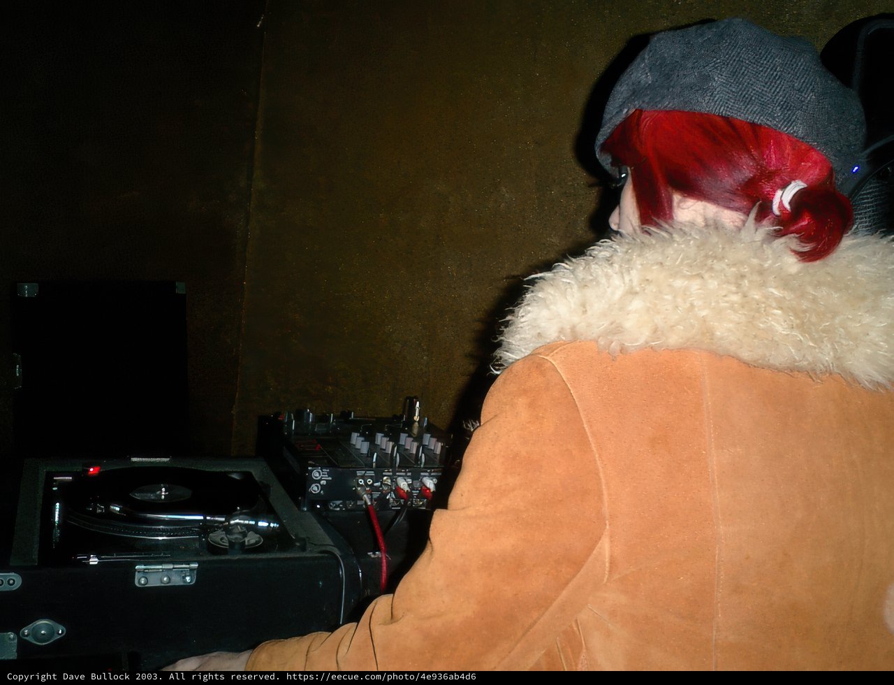 Red-Haired Woman Rocks DJ Set on New Year's Eve