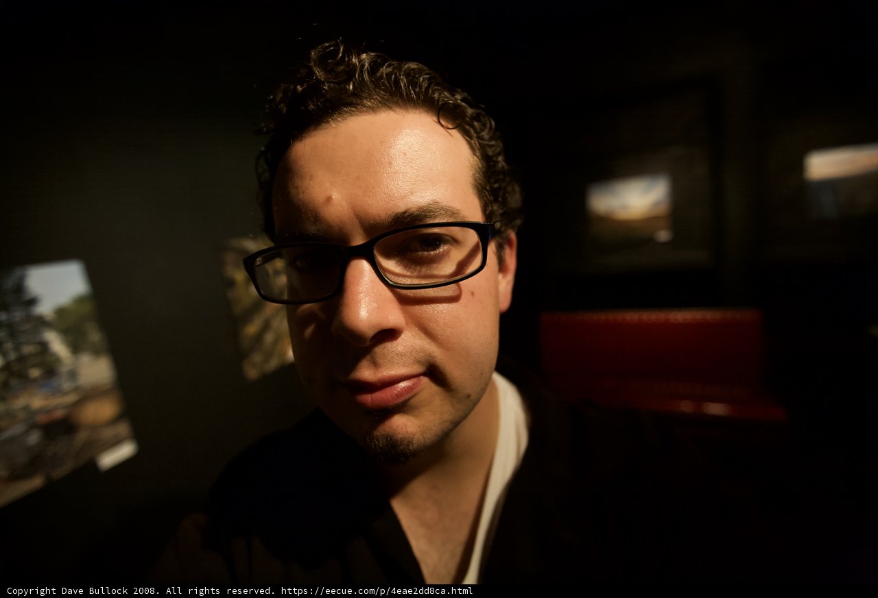 Smiling Man with Glasses