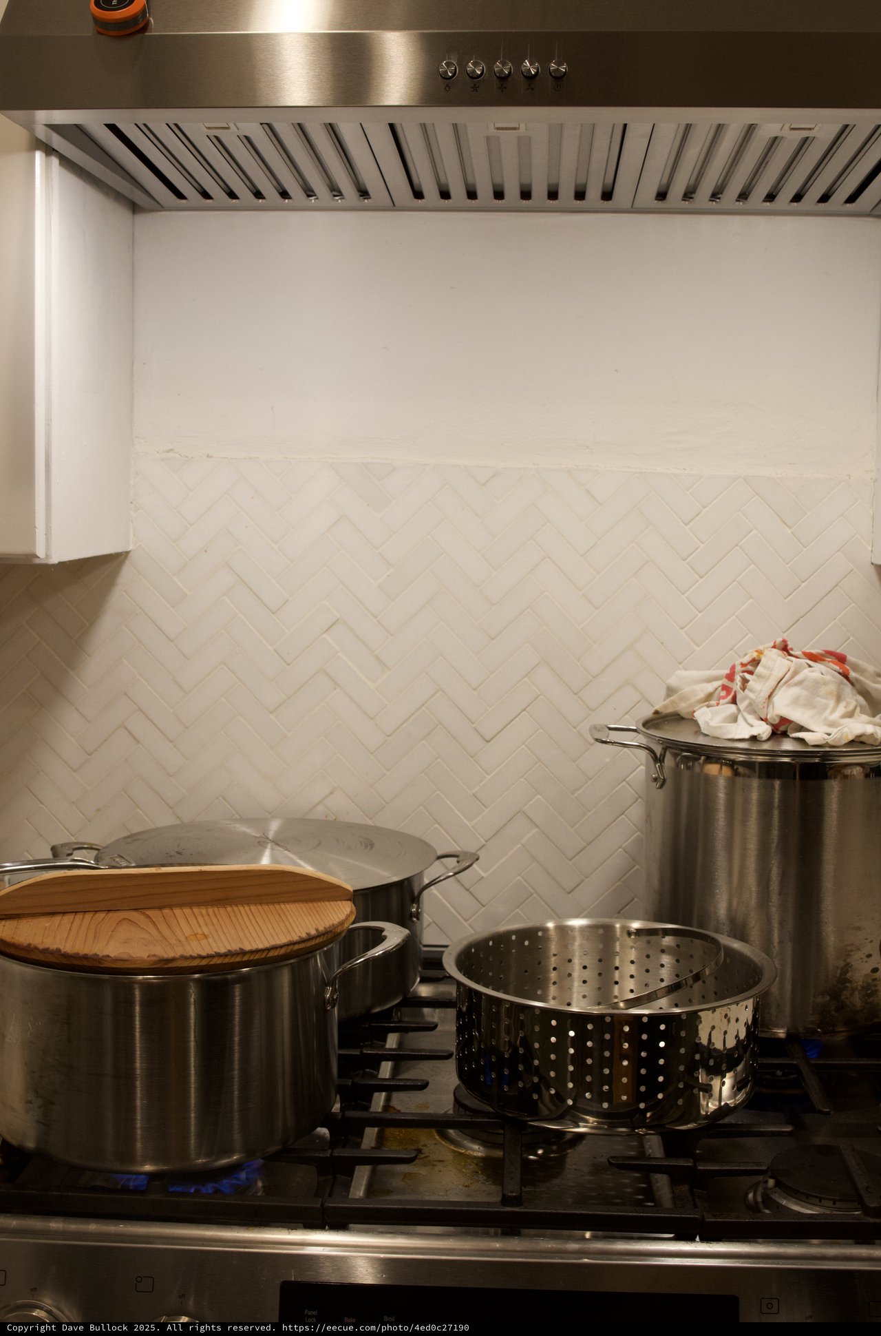Active Kitchen Stove with Multiple Pots During Christmas Cooking