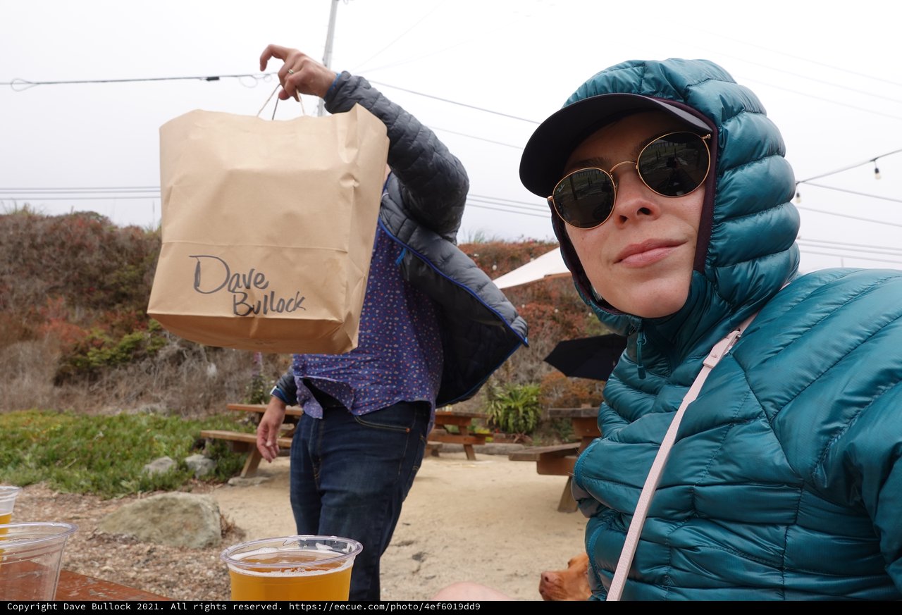 Friends Sharing Food and Drinks Outdoors