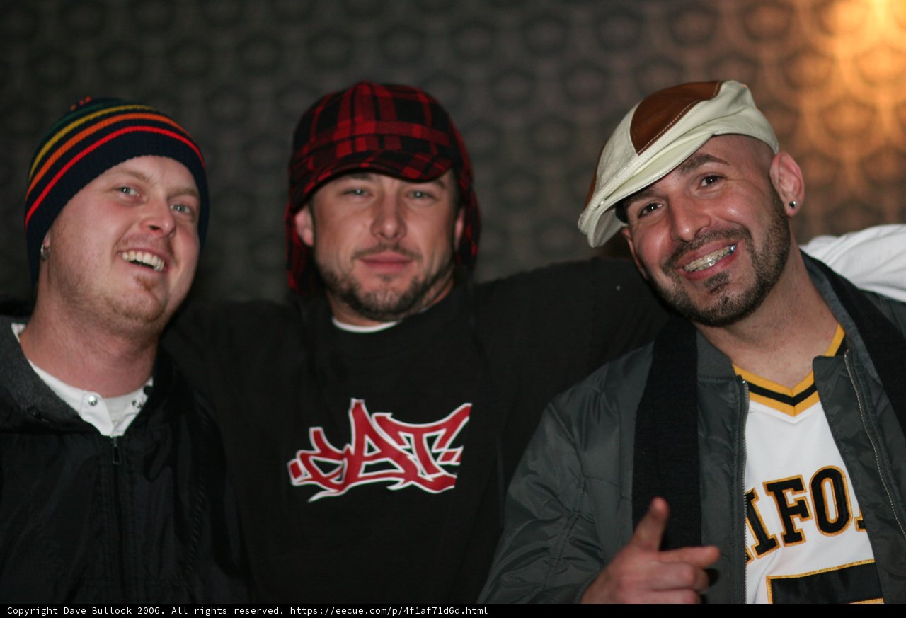 Three Men Strike a Pose