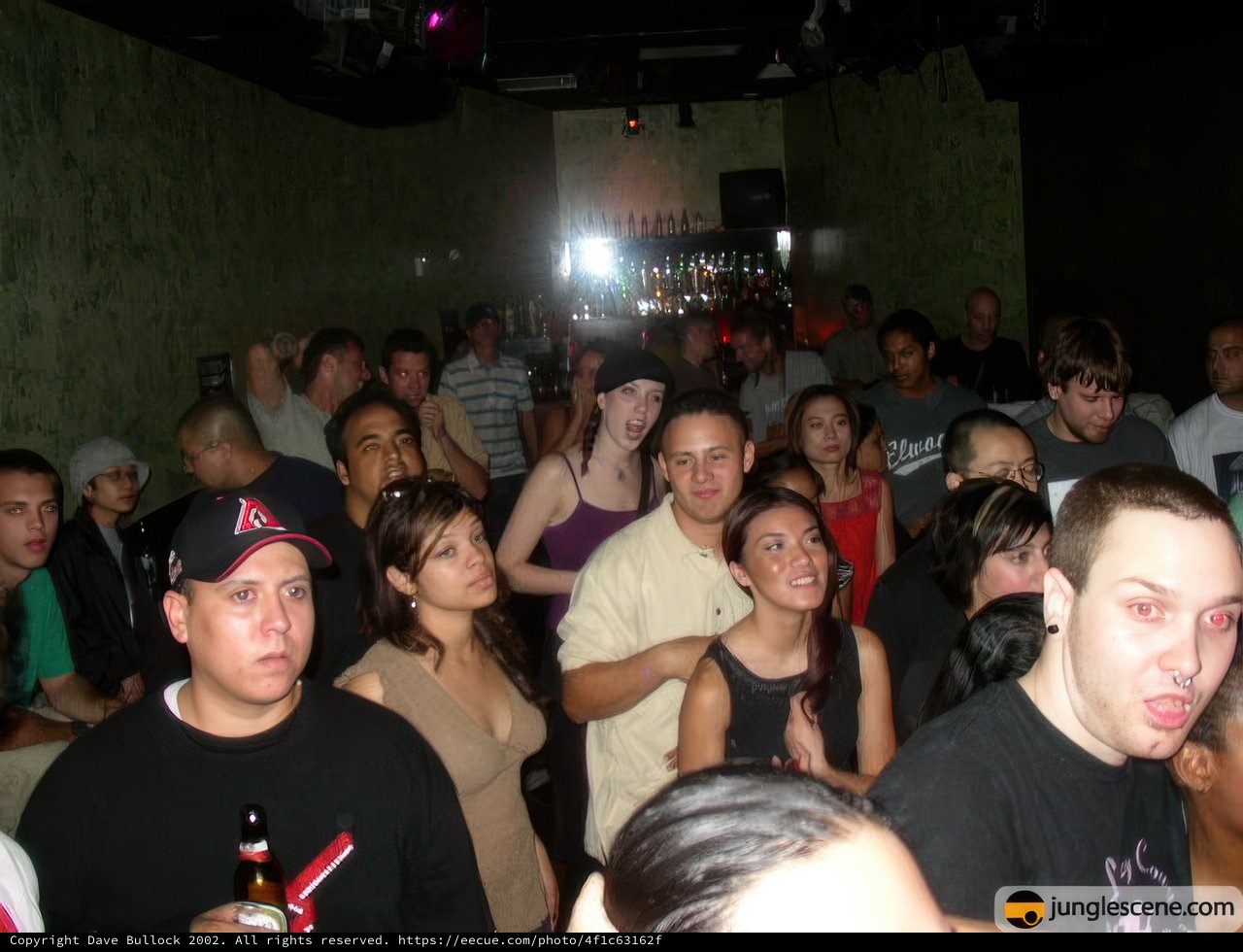 Nightclub Party with Drink in Hand