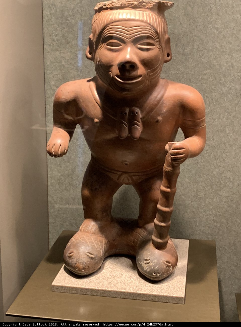 Ancient Bronze Figurine of a Man with a Stick
