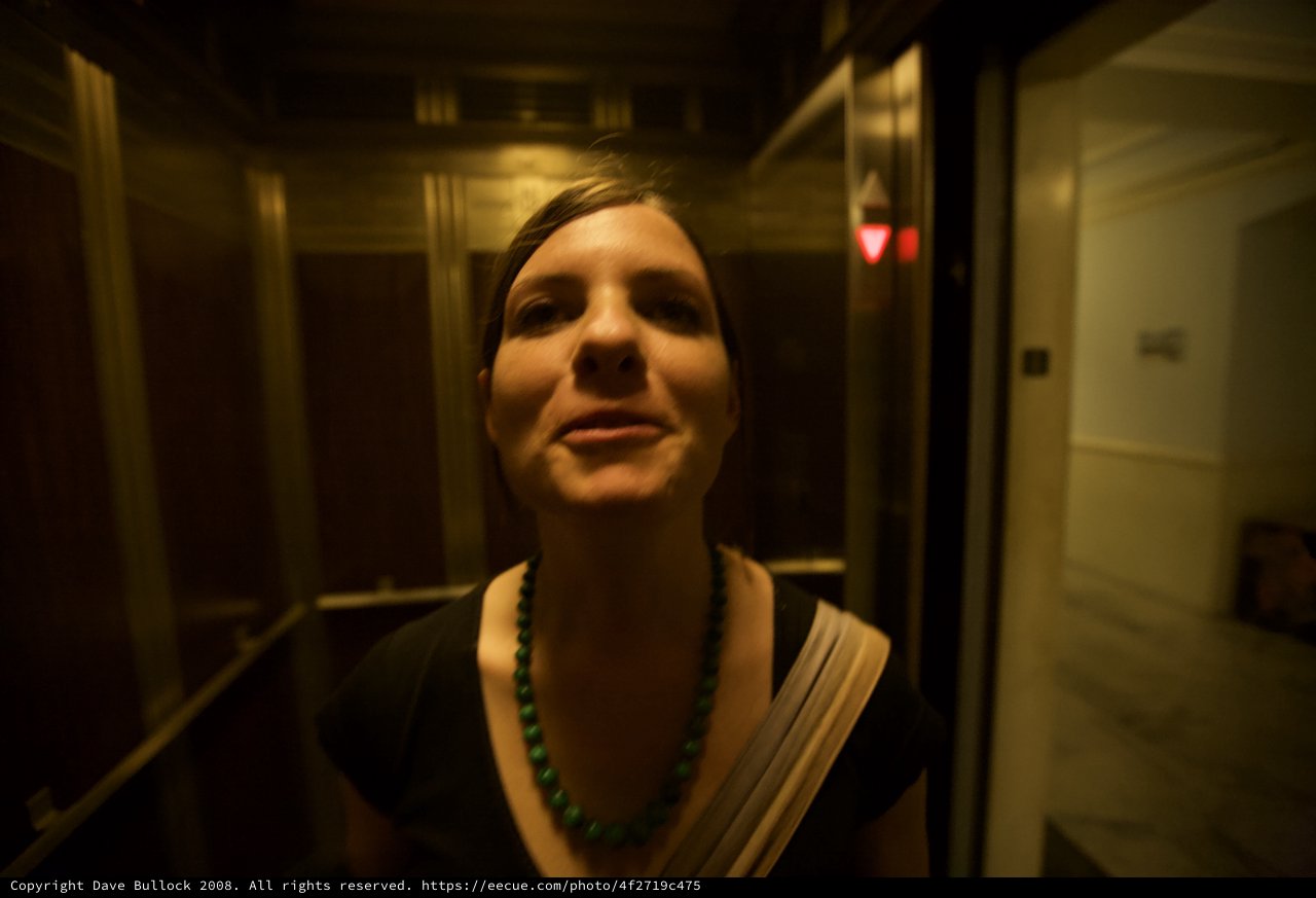 Woman in Elevator During Late Night Art Walk
