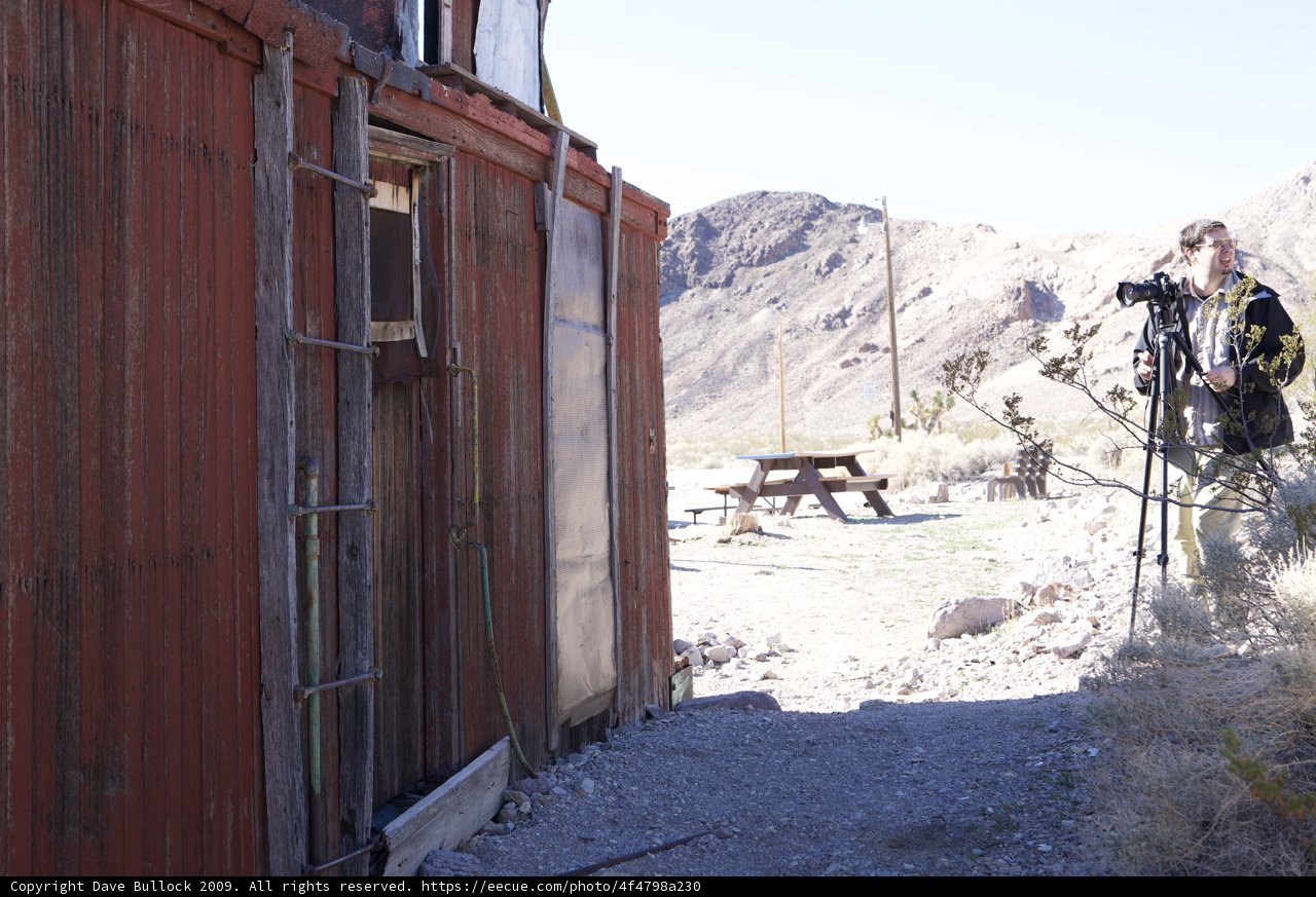 Man and Building amidst Death Valley's Winter Landscape
