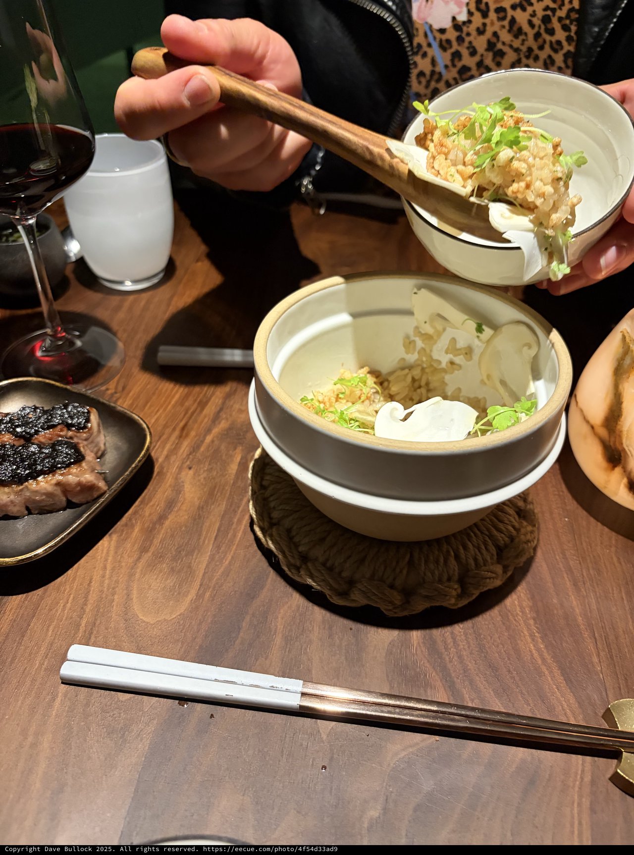 Sharing Salad at an Asian Restaurant Dinner