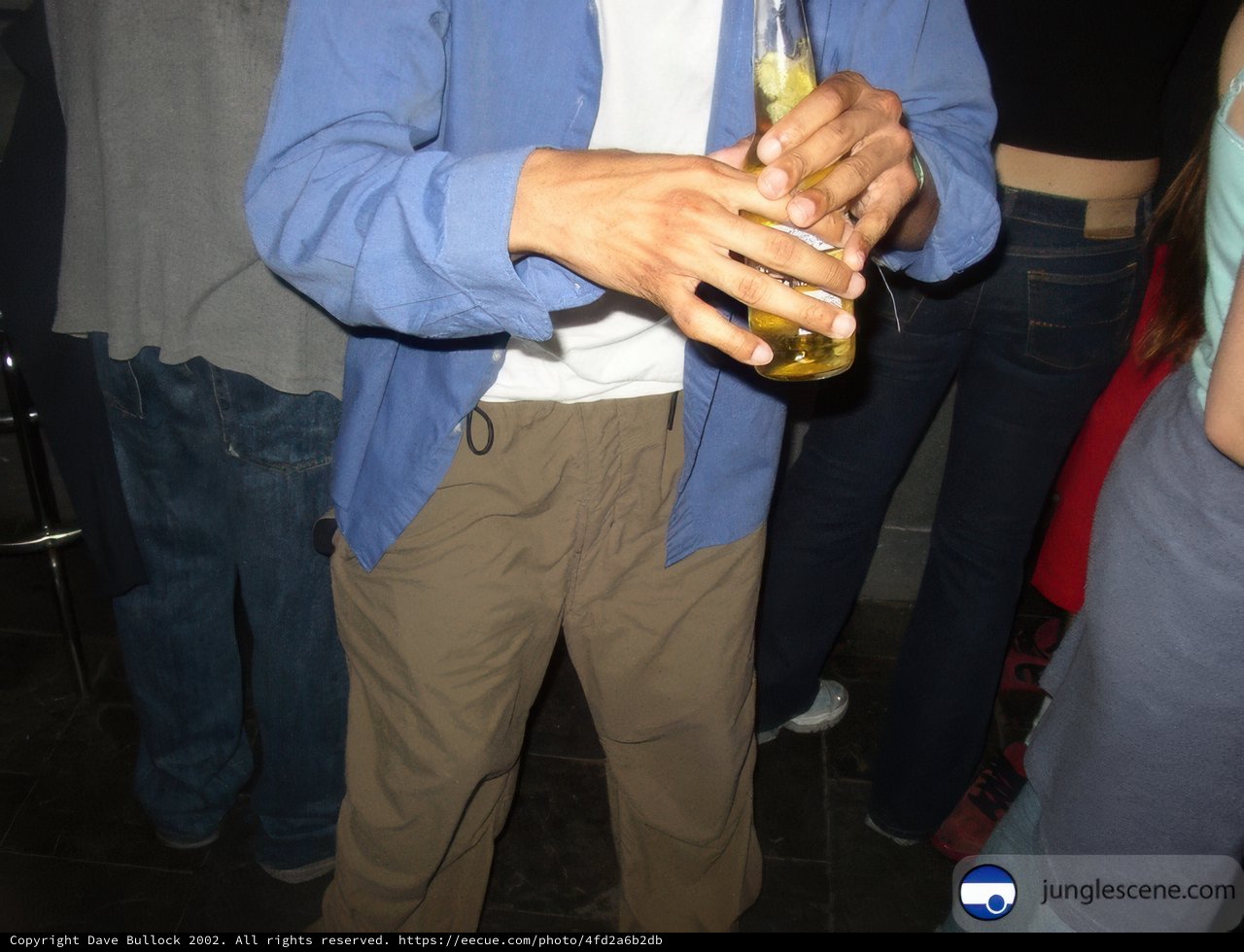 Man enjoying a cold beer at the club