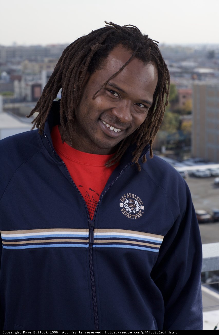 Dreadlocked Man in Cozy Knitwear