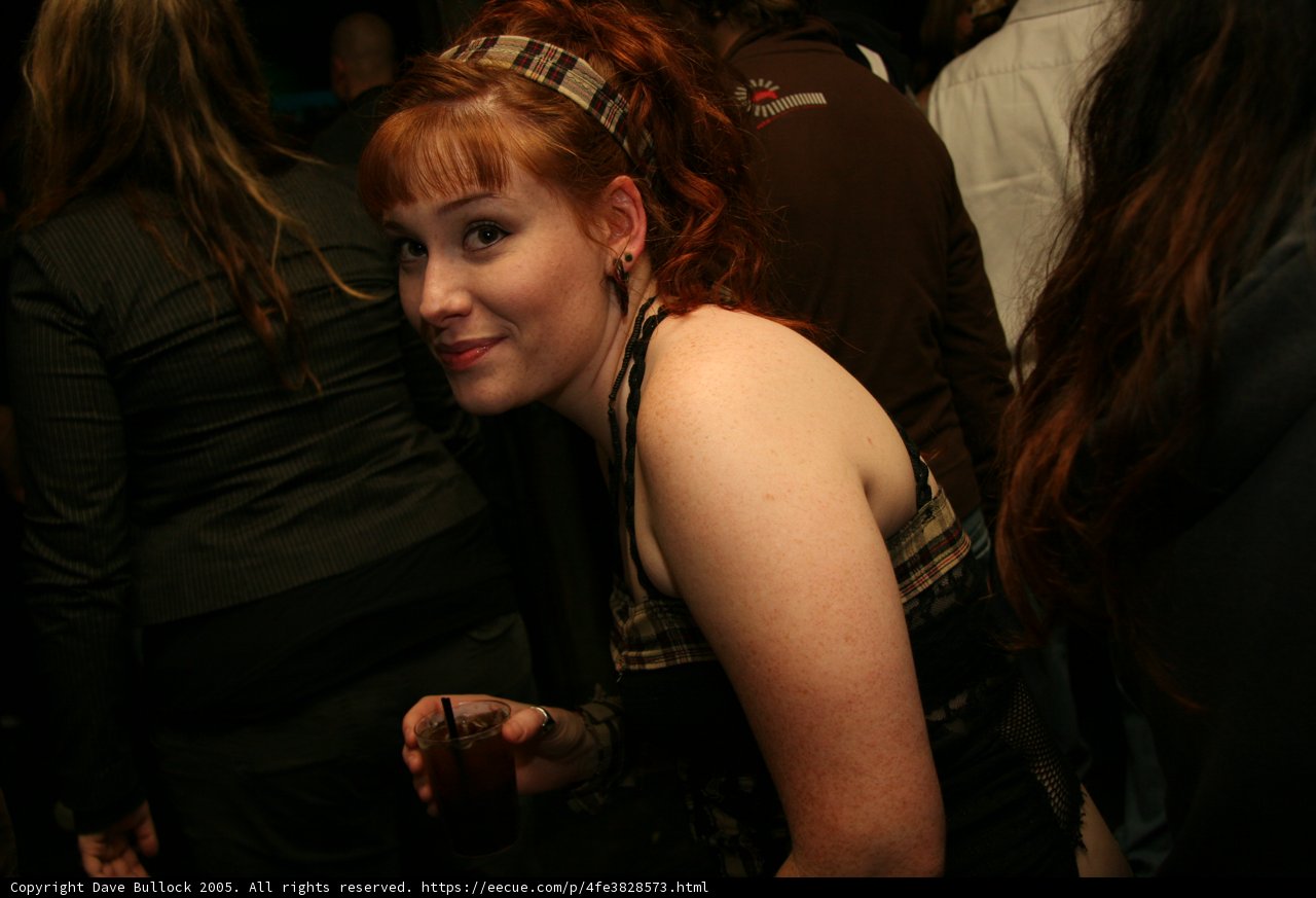 Red-Haired Beauty at the Club