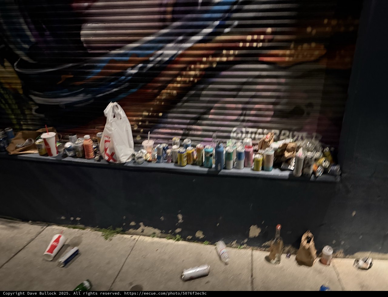 Street Tailor's Colorful Thread Collection at Night