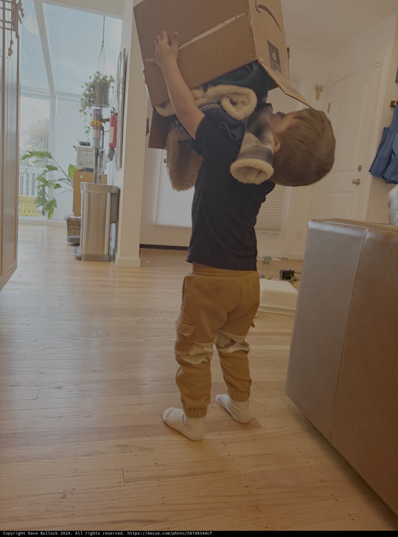 Child Plays with VR Headset at Home