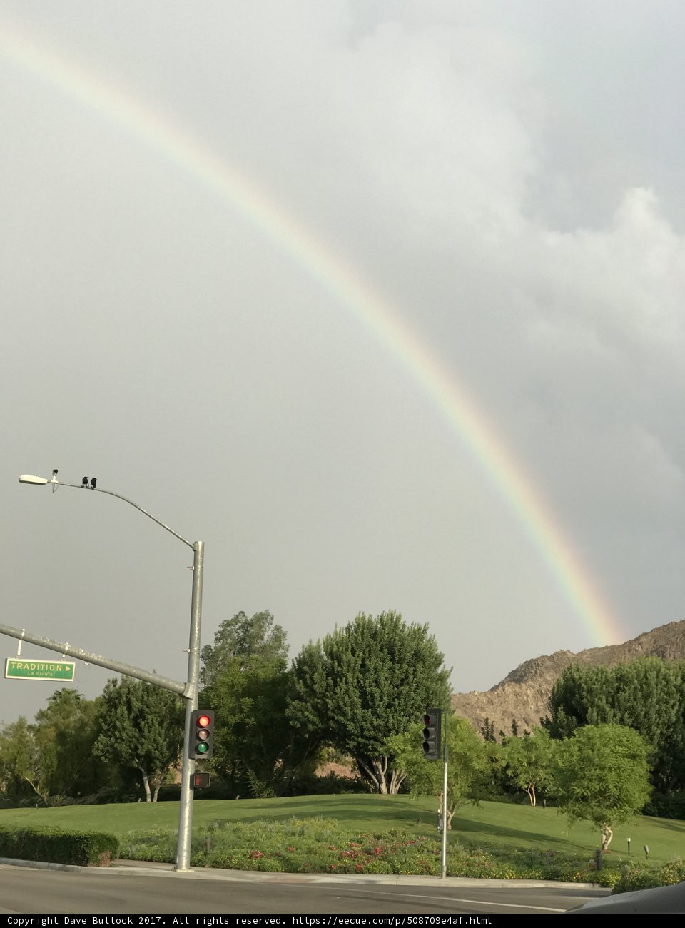 Rainbow over the Streetlight and Hill