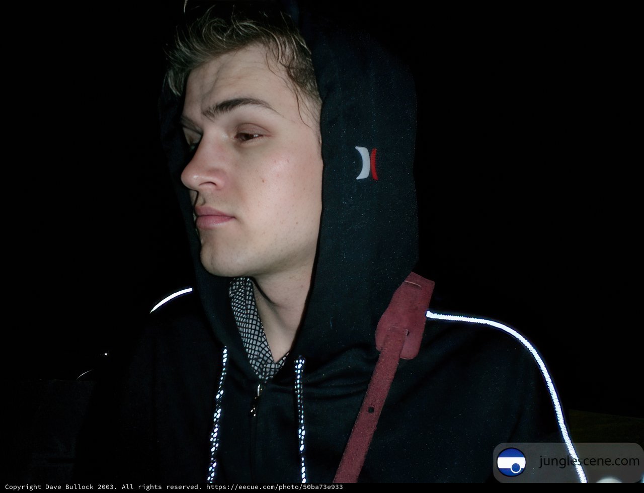 Hooded Man Contemplating