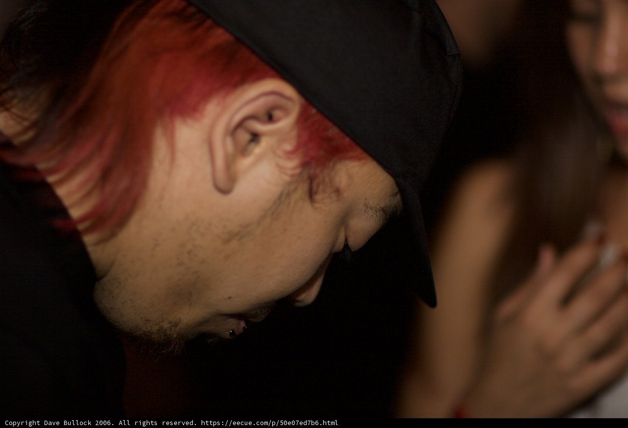 Redheaded Man Checking Phone