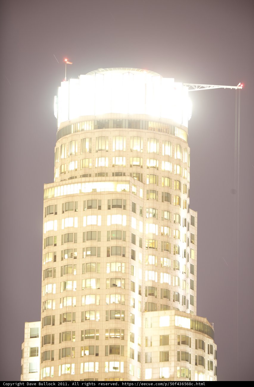 The Majestic Clock Tower of the Urban High Rise Building