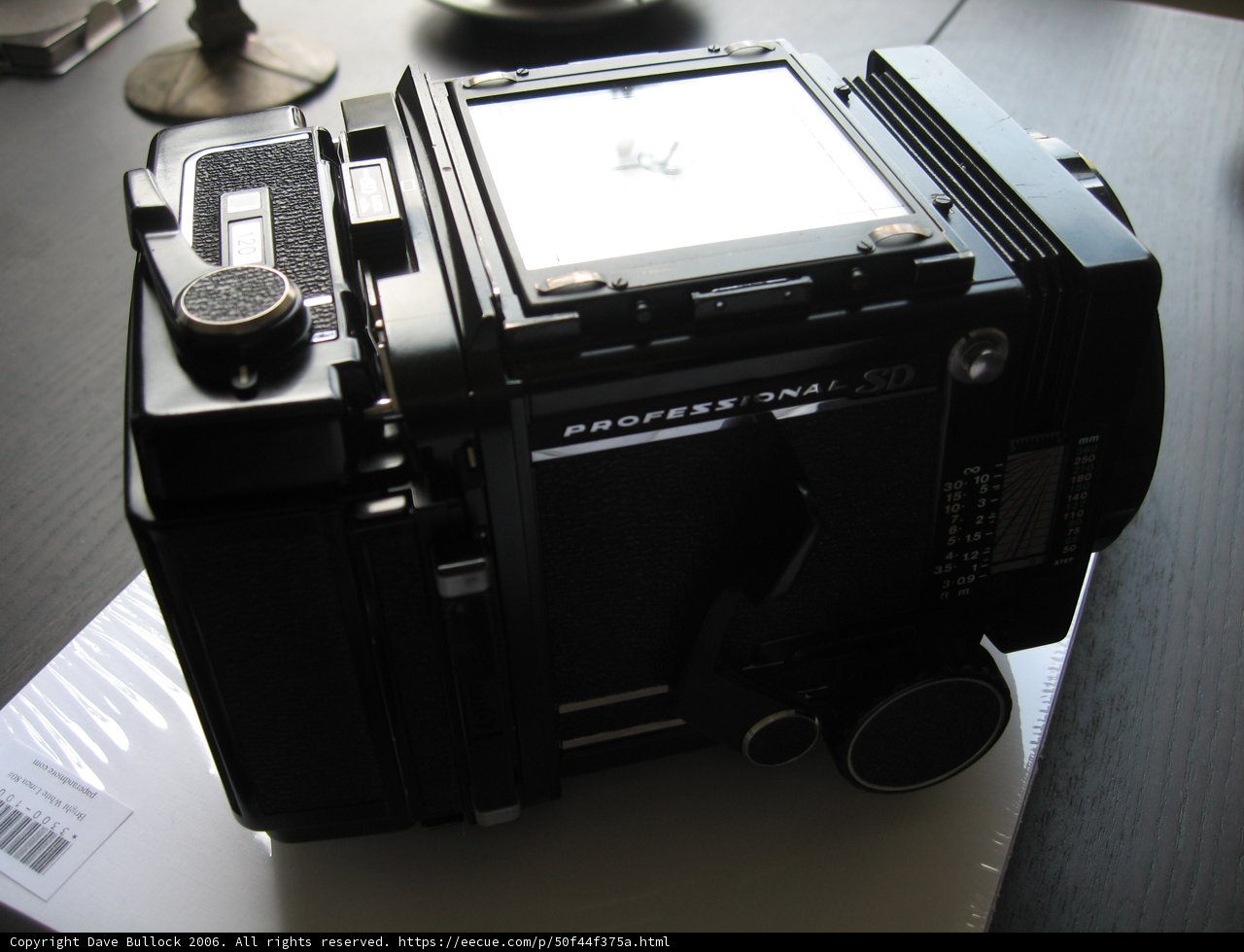 Classic Black Camera on a White Table
