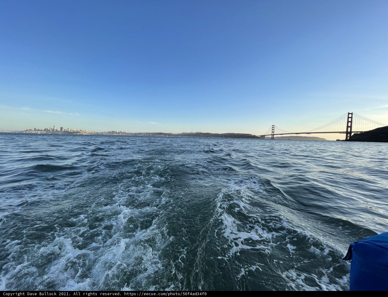 Serene boat ride under the bridge