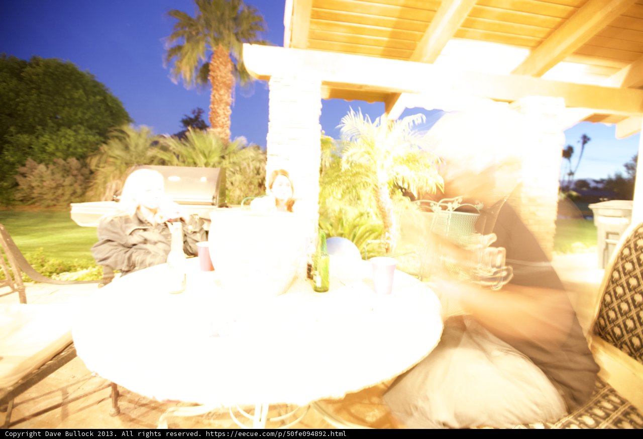 Blurry Figure at the Summer Dining Table