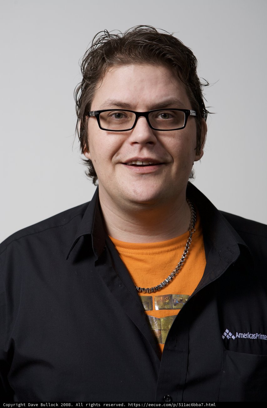 The Happy Man in Black Glasses