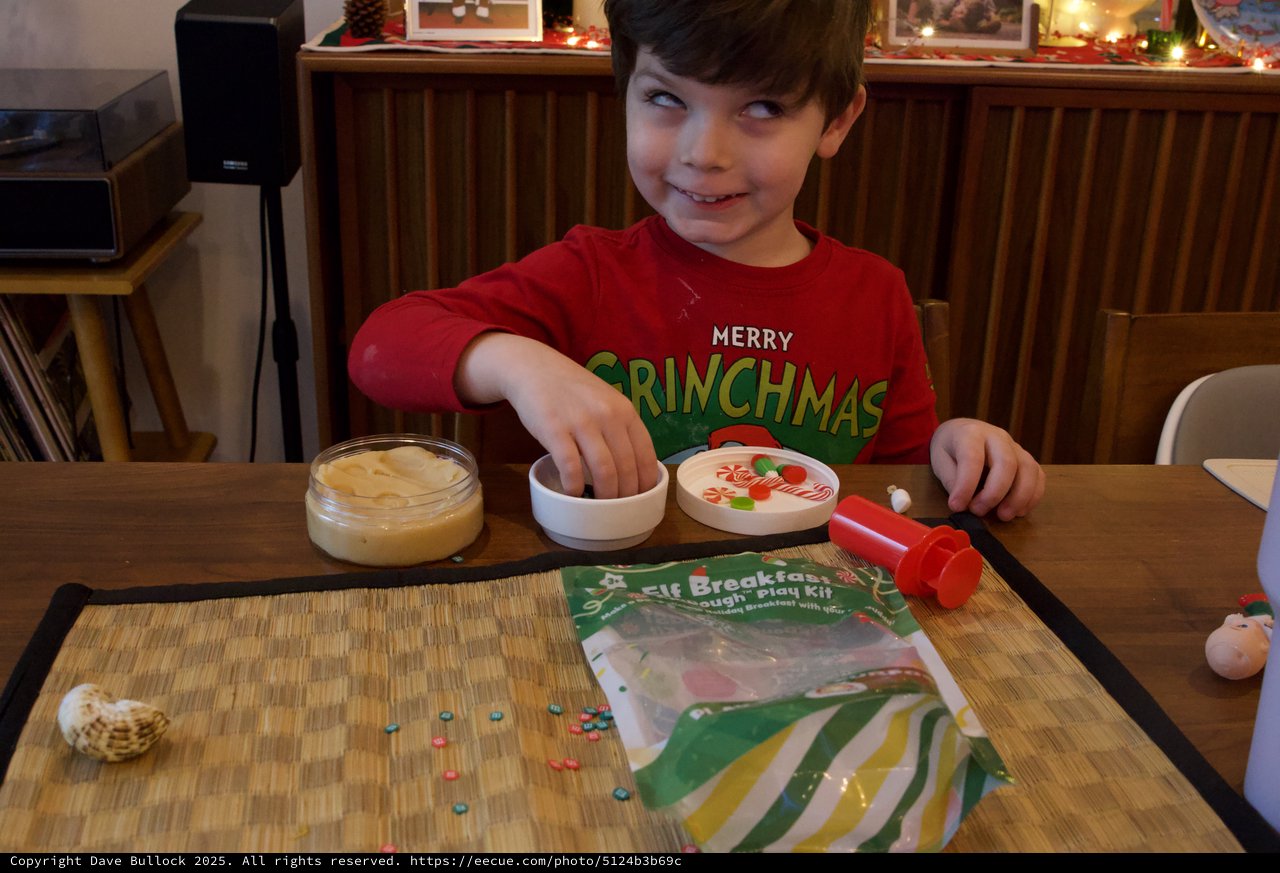 Child Playing with Elf Breakfast Play Dough Kit at Christmas