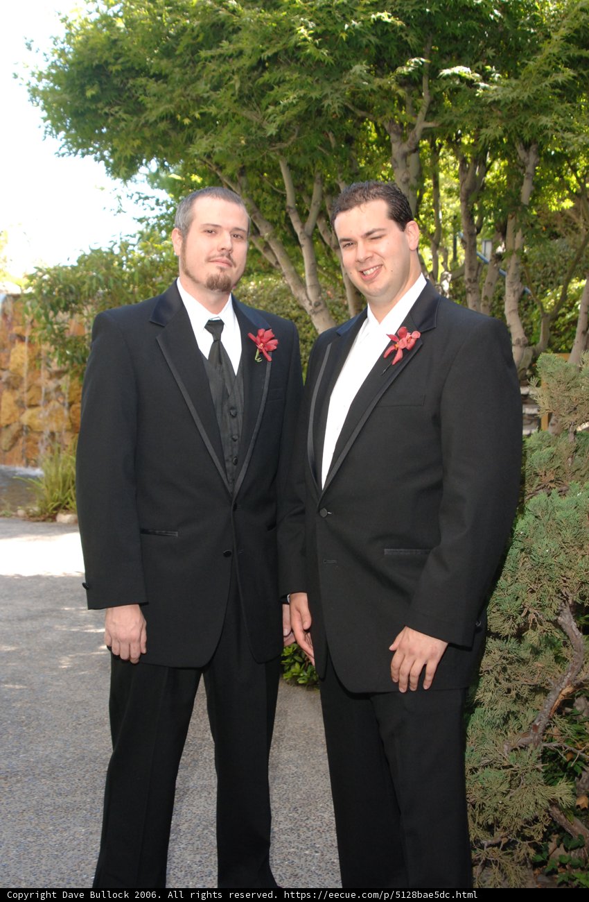Two Men in Formal Wear Strike a Pose