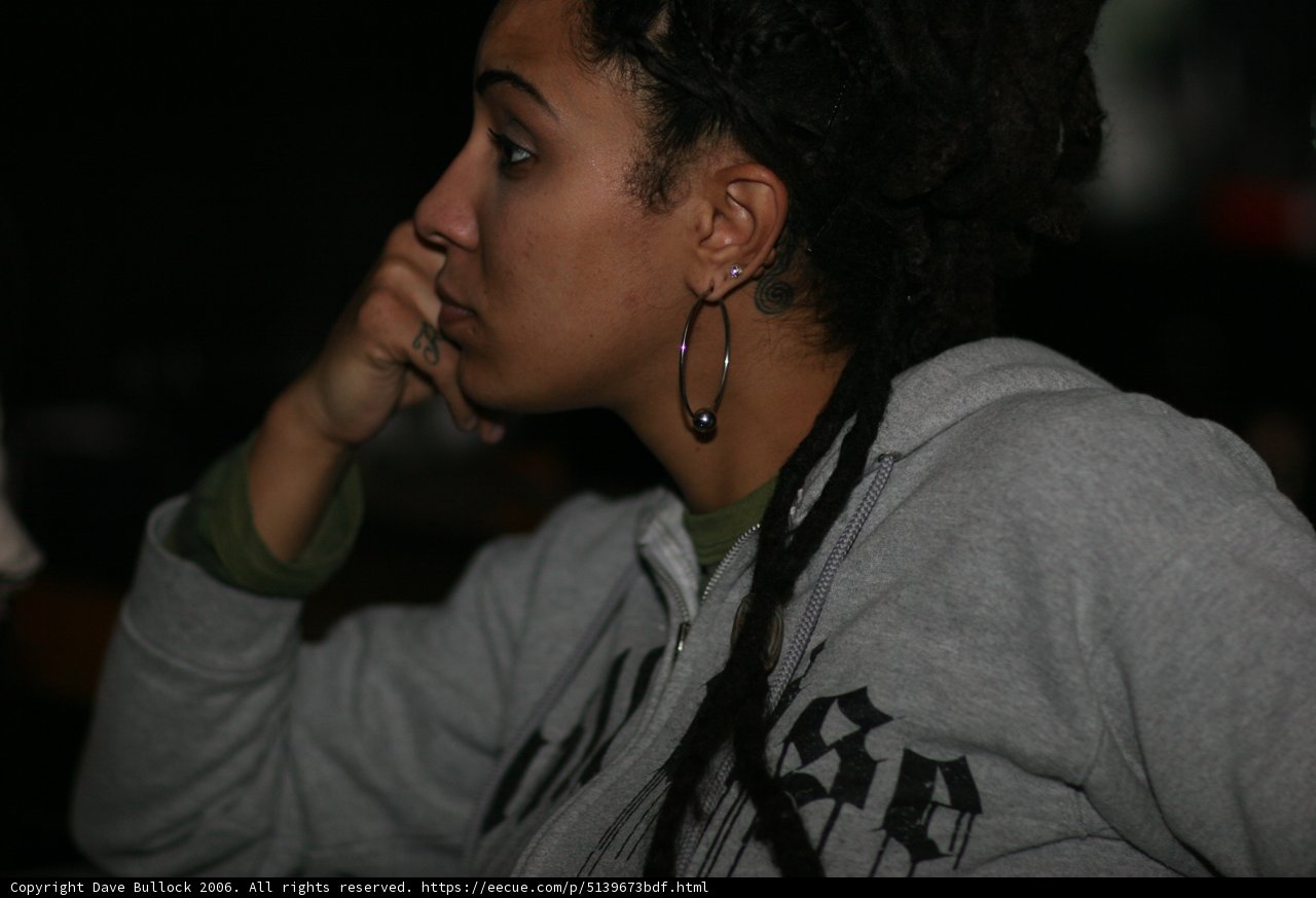 Dreadlocked Woman in Knitwear Hoodie