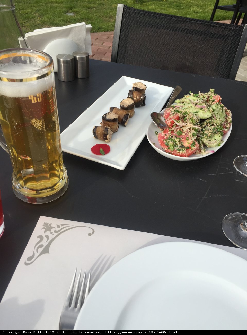 Beer and Food at an Outdoor Table