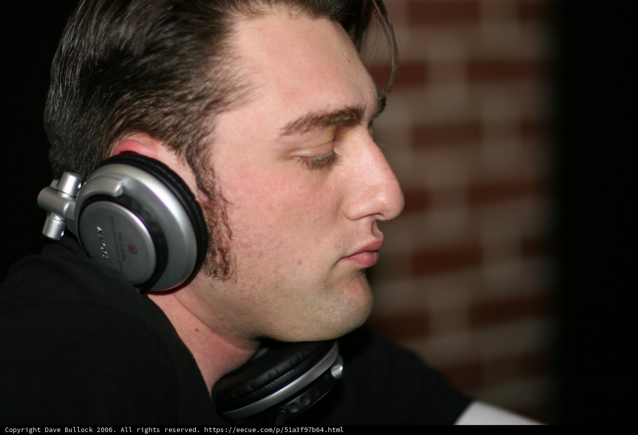 Grooving with His Headphones On