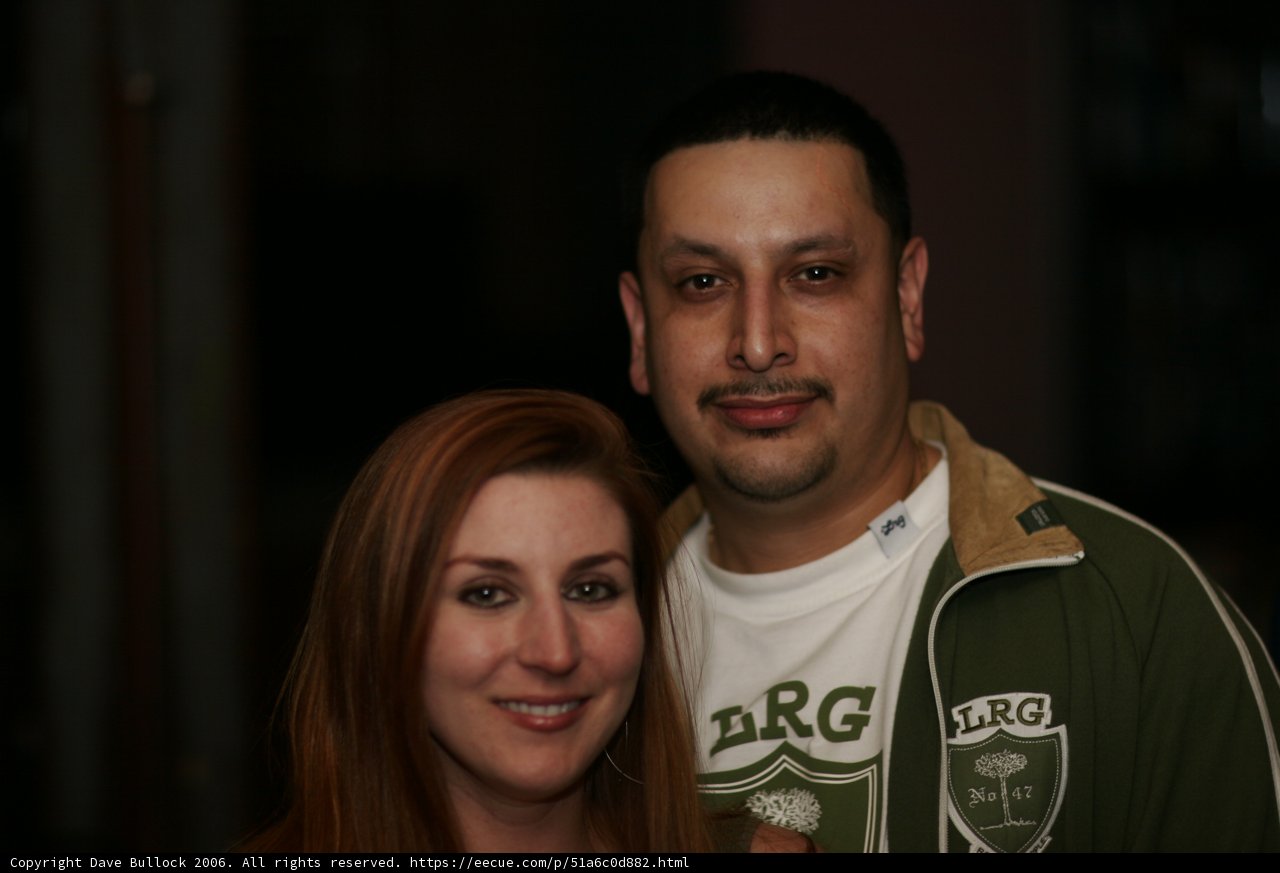 A Happy Couple Poses for the Camera