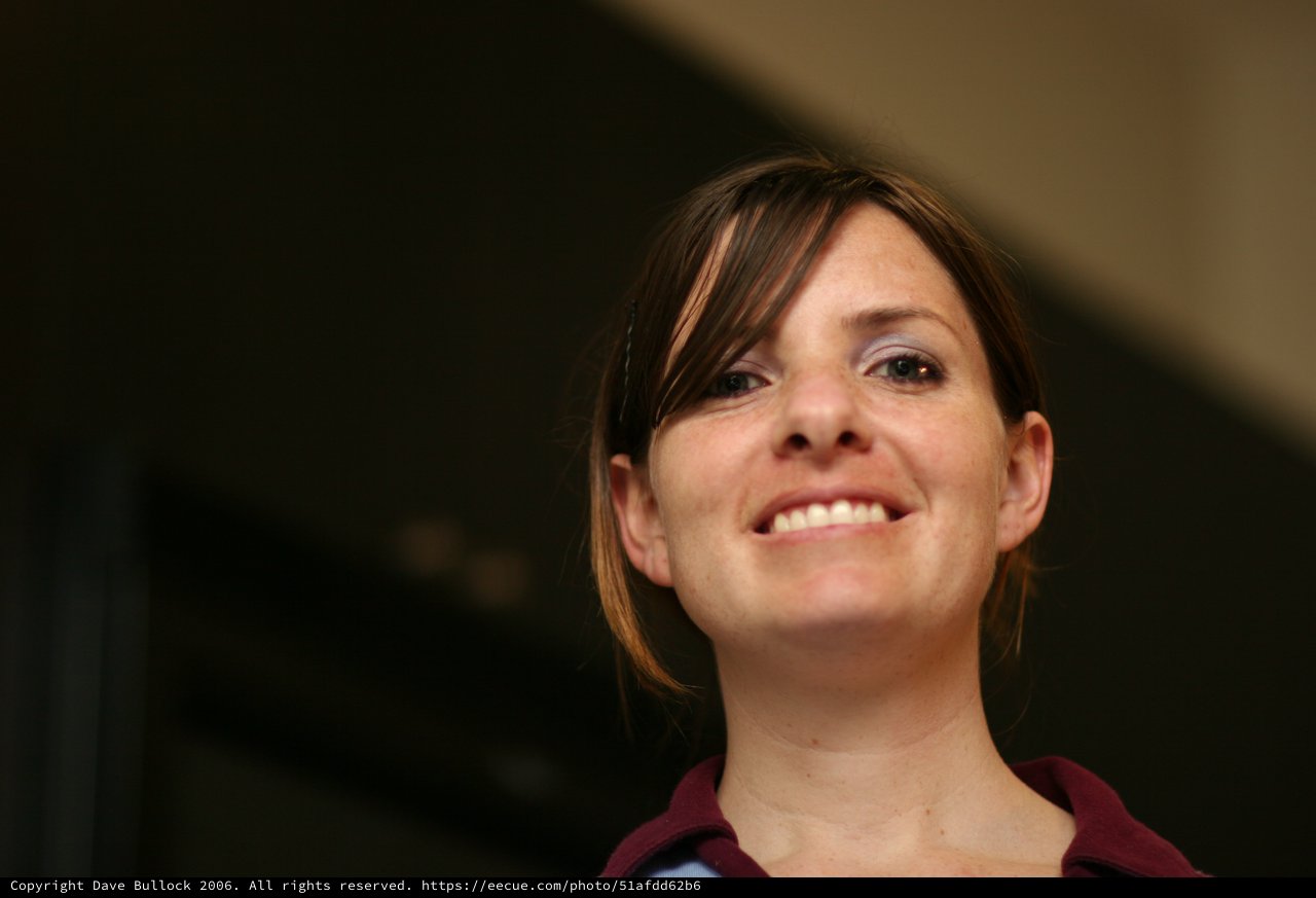 Candid Portrait of a Smiling Young Woman Indoors