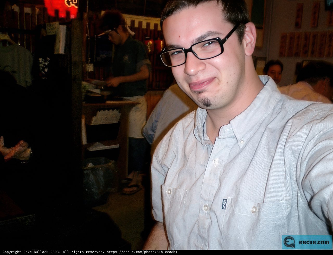 A Portrait of James Liang in Glasses