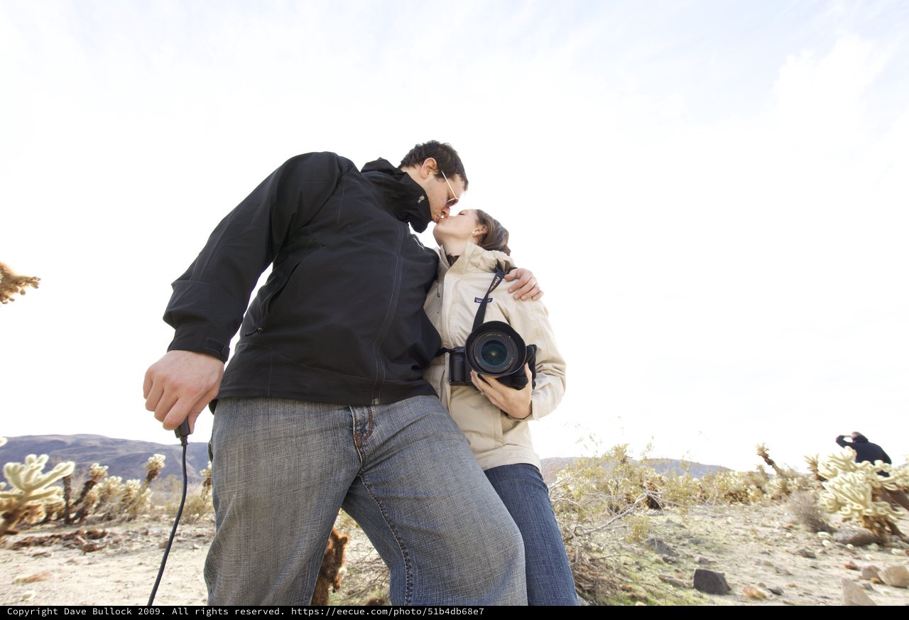 Couple Shares a Kiss in Desert Wilderness
