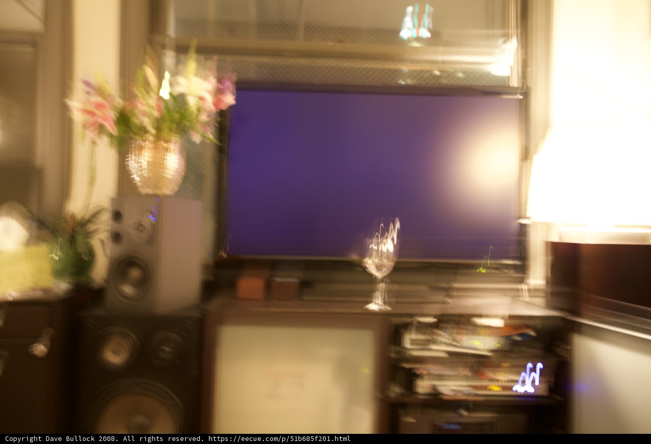 Entertainment Center with Flower Arrangement
