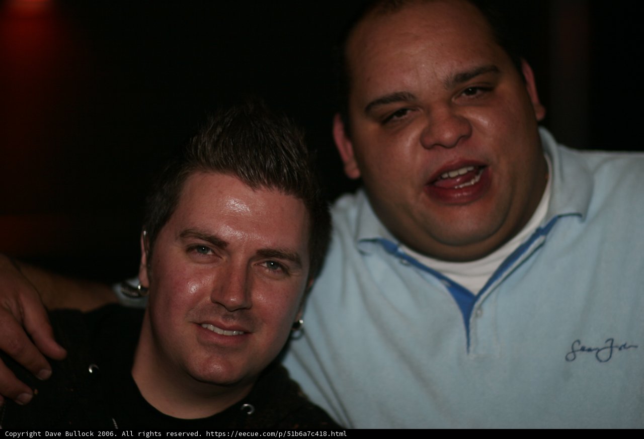 Two Men Strike a Pose