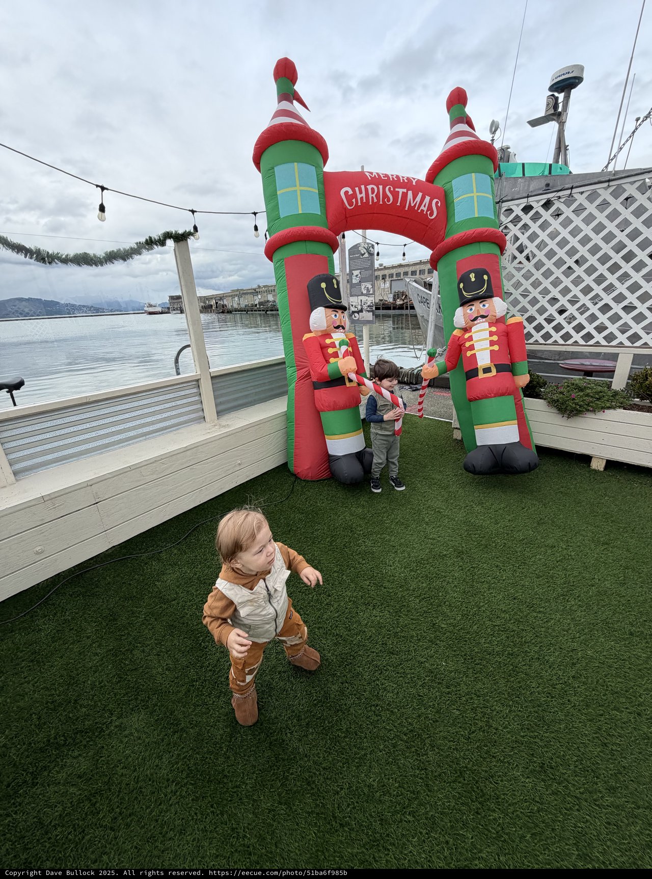 Children Playing at Waterfront Christmas Display