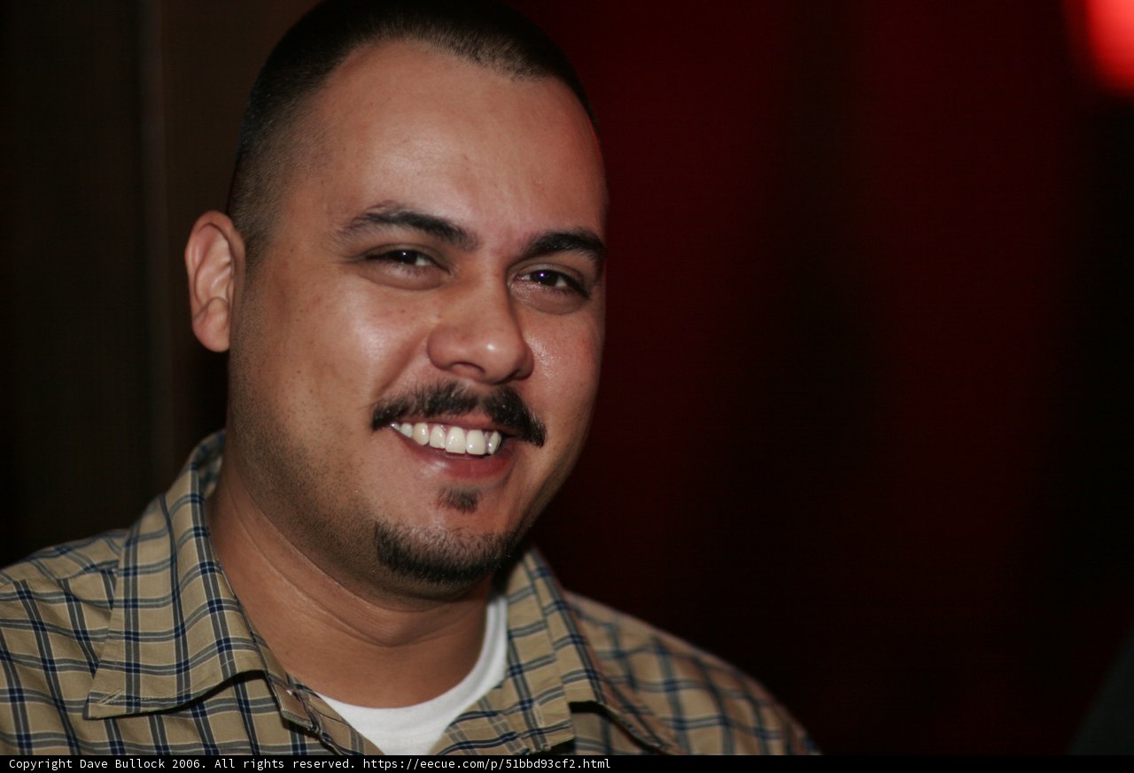 The Smiling Mustache Man