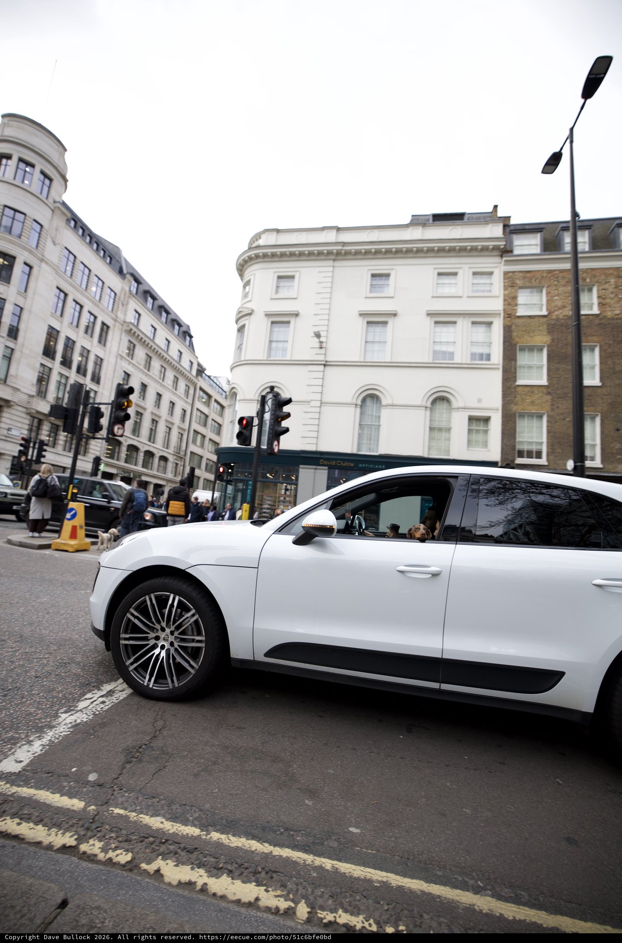 White Luxury Car on London Street Corner