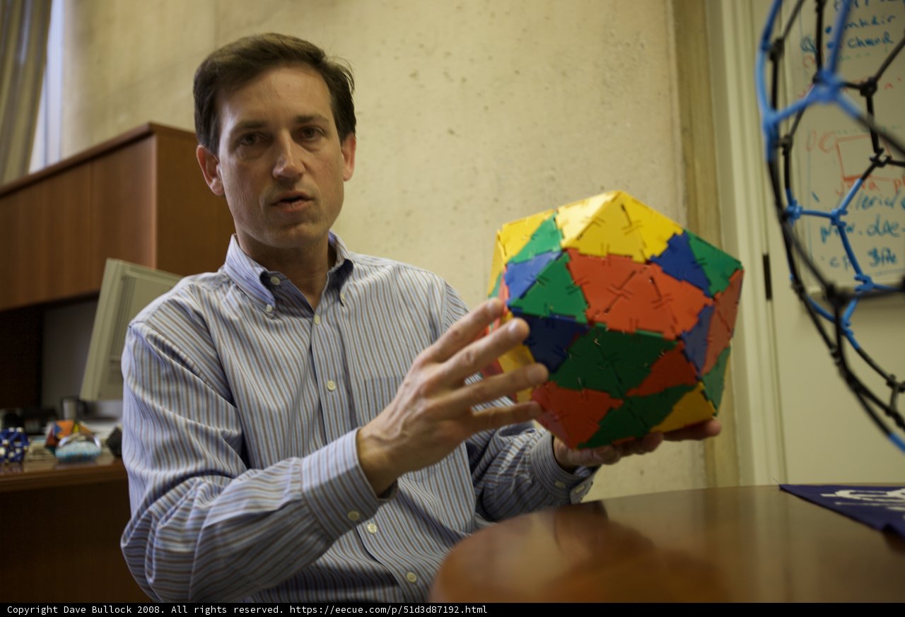 Colorful sphere in man's hands