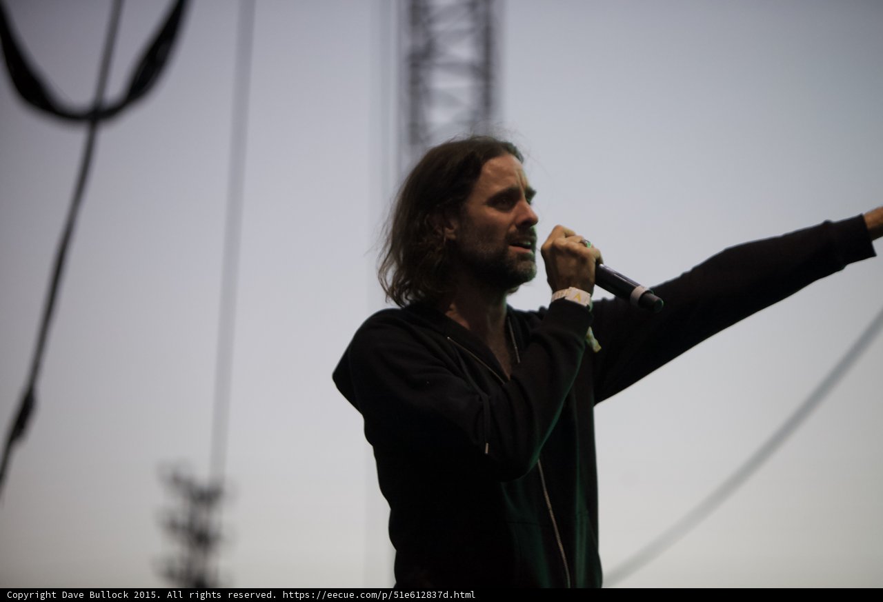 Performer Arm Outstretched Gray Sky