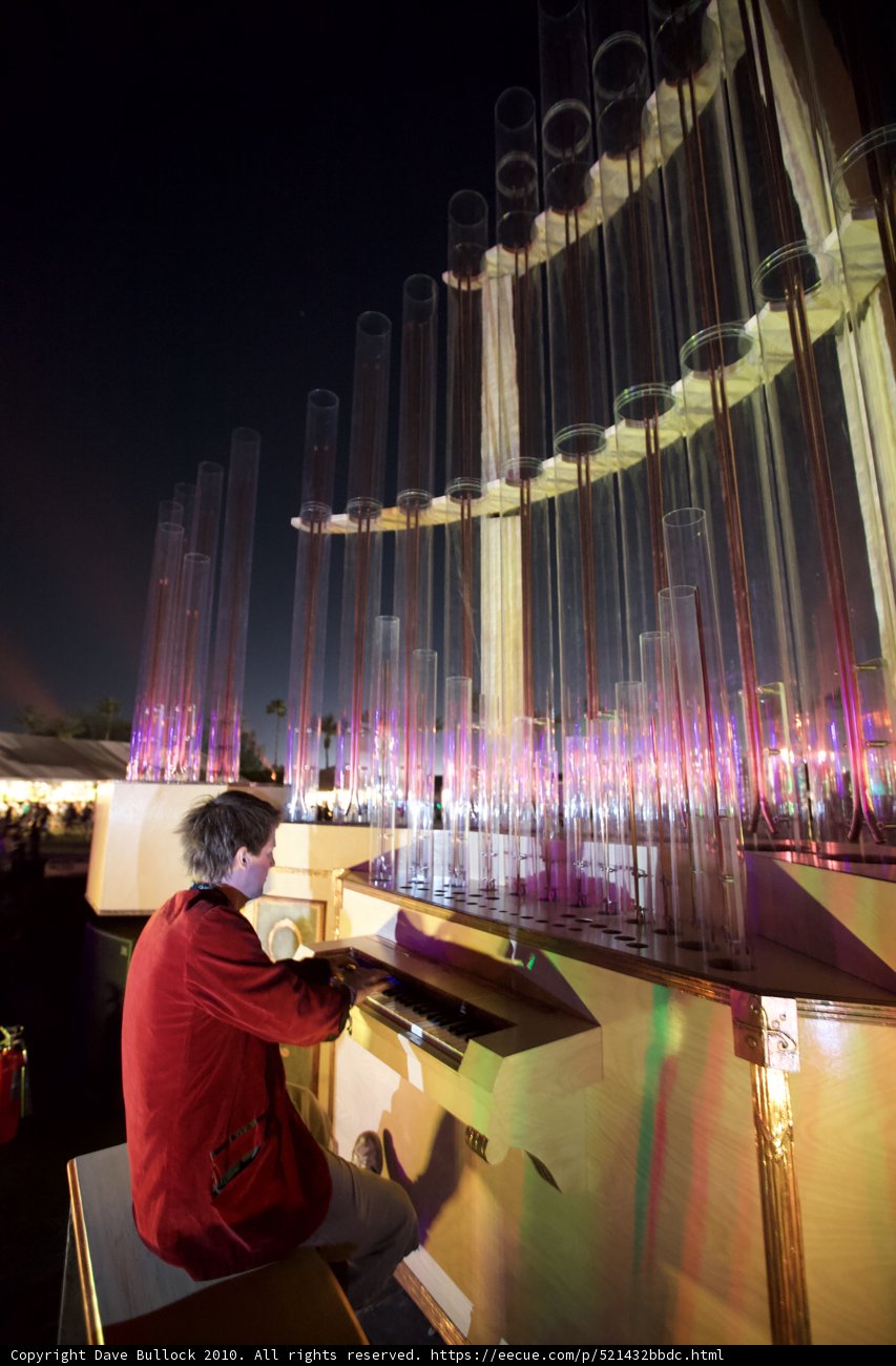 Organ Player in Front of Hanukkah Menorah