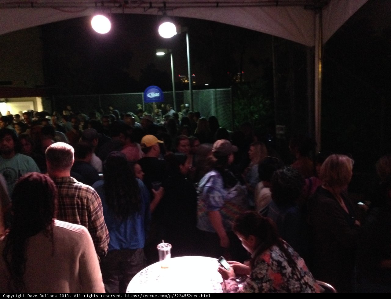 Nightclub Crowd Gathers Around the Table