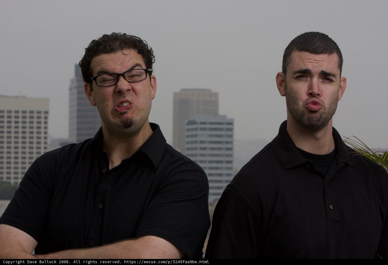 Brothers in Black by the Skyscraper