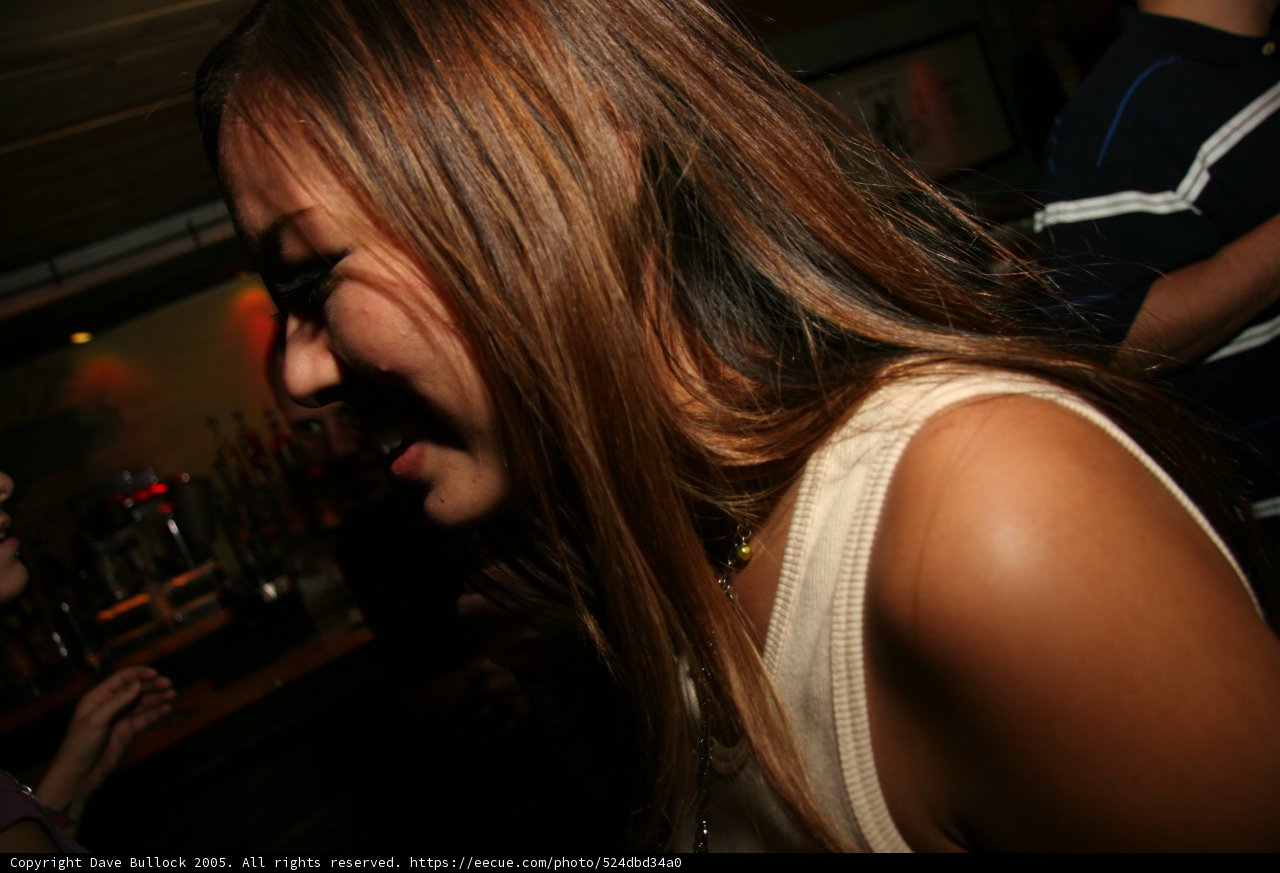 Party Girl Laughs at Pub